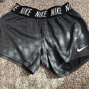 Gray and black Nike shorts